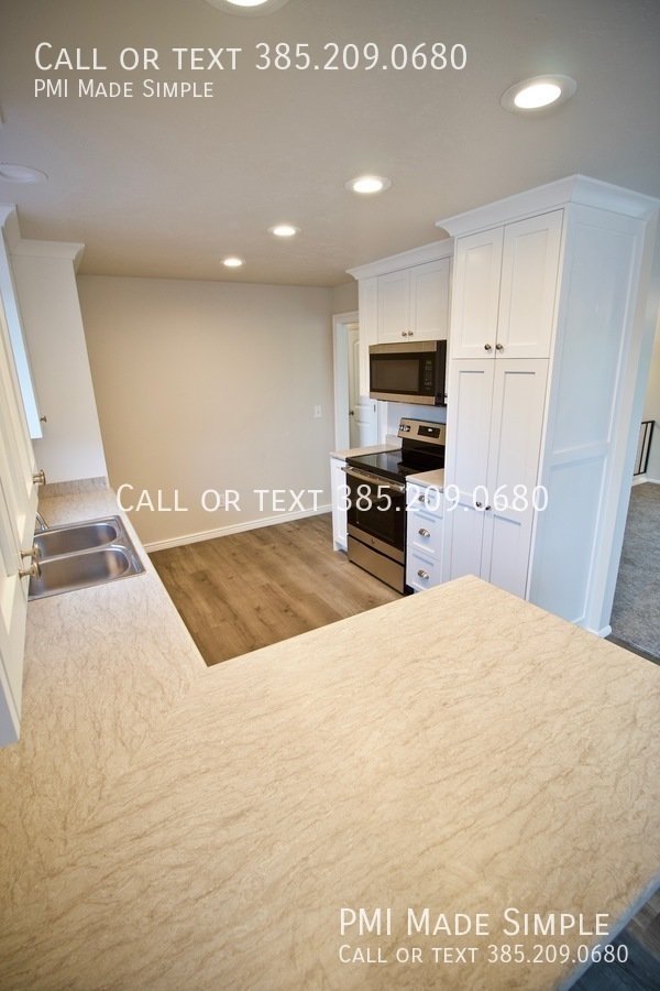 Updated home with HUGE backyard in prime Orem location! COMING SOON! property image